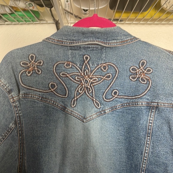 This is a Jean jacket with beautiful stitching,, it’s been worn once or twice. - Picture 3 of 4